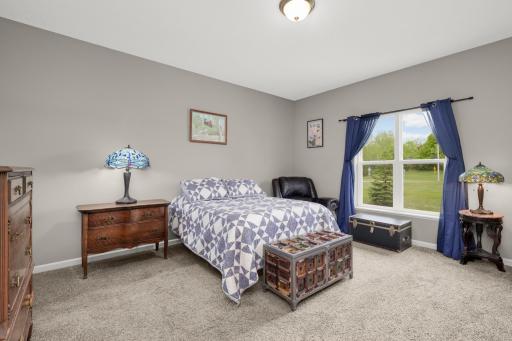 Light filled large master bedroom off living room