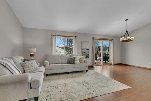 Walk up the stairs and be greeted by an expansive living room.