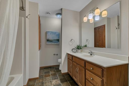 Full shared, walk through bathroom. Clean, well maintained, and a large vanity with storage space for all necessities.