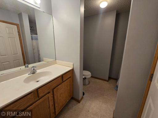 2nd upper full bath with a tub/shower area