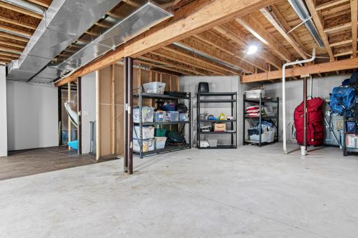 Great space for a future family room/wetbar area and bathroom.