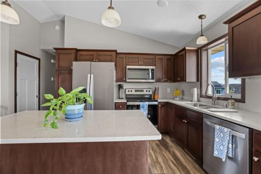 Hard surface countertops and Stainless steel appliances