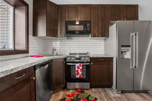 Stainless steel appliances - subway backsplash