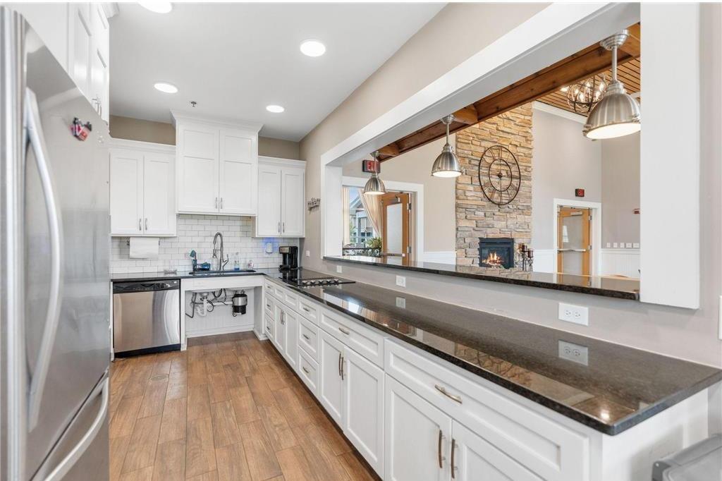 Host with ease in this stunning kitchen, perfectly equipped to serve and display your event dishes. The room can be designed for a table set that works for the occasion.