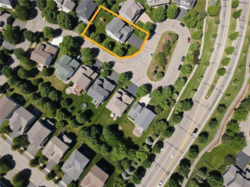 This aerial view says it all: the largest cul-de-sac in Stonemill Farms, a true neighborhood favorite. Safe for kids with local traffic only, plus a walking path right there to explore the rest of the trails.
