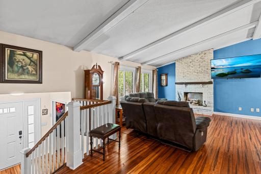 As you enter the home, you immediately notice the beautiful bamboo wood floors which provides a rich and warm elegance