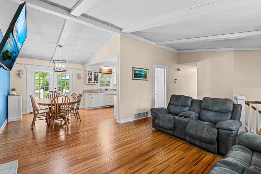 The informal dining room opens to the outdoor patio and kitchen making entertaining easy and intimate.