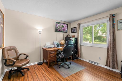 Upper-level bedroom #2 which create a perfect office space offering flexible living space.