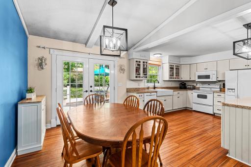The kitchen, flooded with natural light and its all-white aesthetic create a classic look and feel