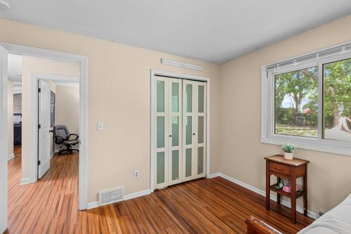 The beautiful wood floors seamlessly flow throughout the upper level