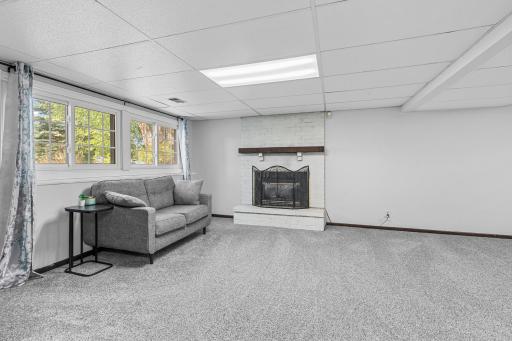 Generous level-level family room and fireplace - so many possibilities for living, lounging and enjoying