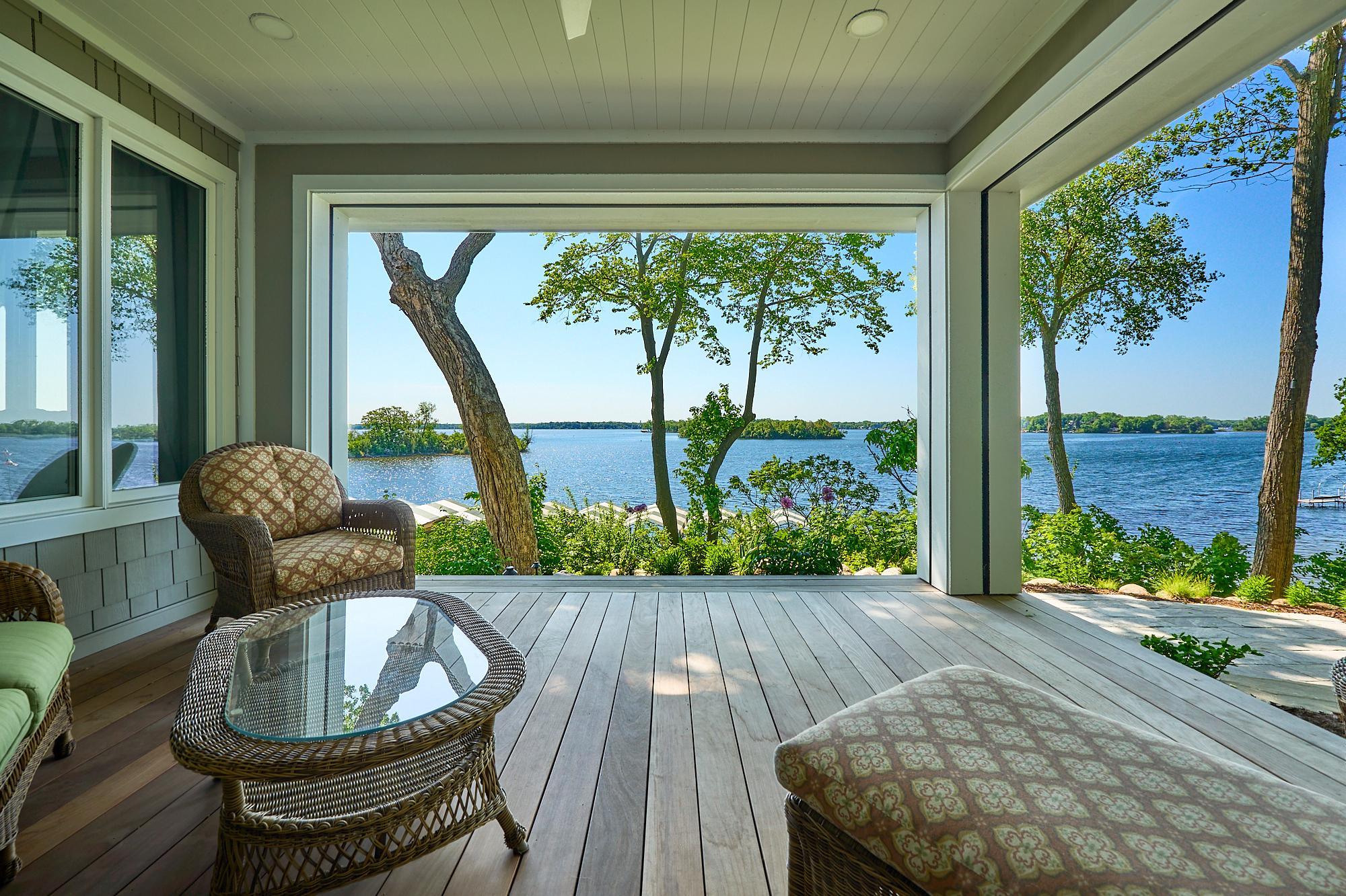 Sweeping southerly views of Lake Minnetonka’s Spring Park Bay, a quieter & more refined bay protected by Phelps Island.
