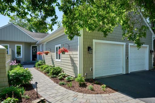 Newly professionally designed landscaping complements this homeâs elegance. Hardie Board shingle-style siding and trim, an underground sprinkler system, and rainwater management systems make this a delightful place to come home to and relax in.