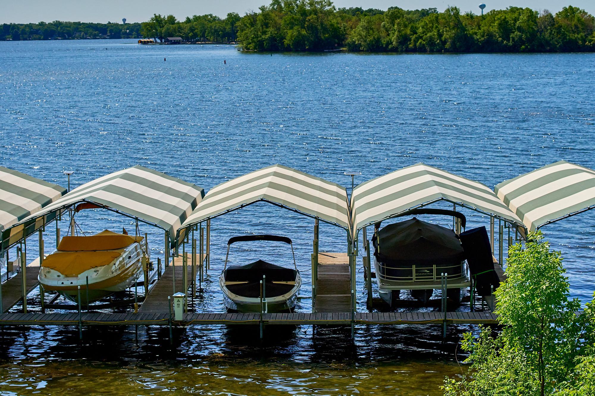 This quiet, protected bay is a quick boat ride to all that Lake Minnetonka offers