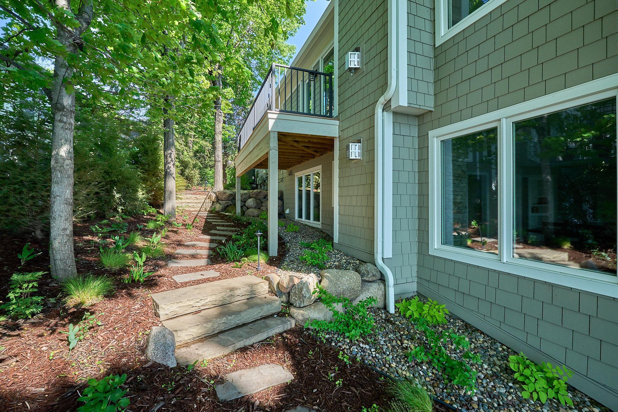 The 3 new decks have premium Ipe (ironwood) decking and non-rusting aluminum railings. All of the windows were replaced with Marvin Ultimate windows. Each window was enlarged (taller) to maximize natural light and to allow more dramatic lake views.