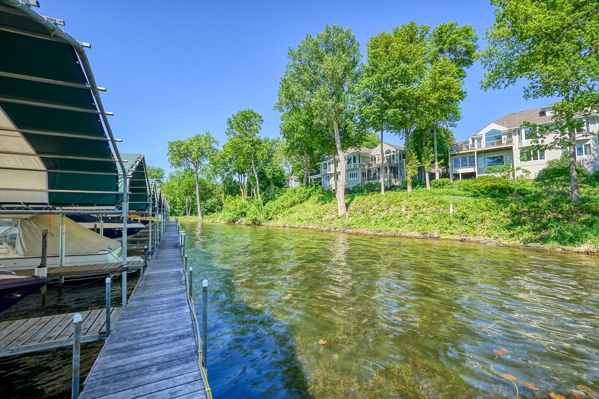 Shared amenities include a boathouse, picnic area, golf cart paths, beautiful, well-kept grounds, and optional social gatherings