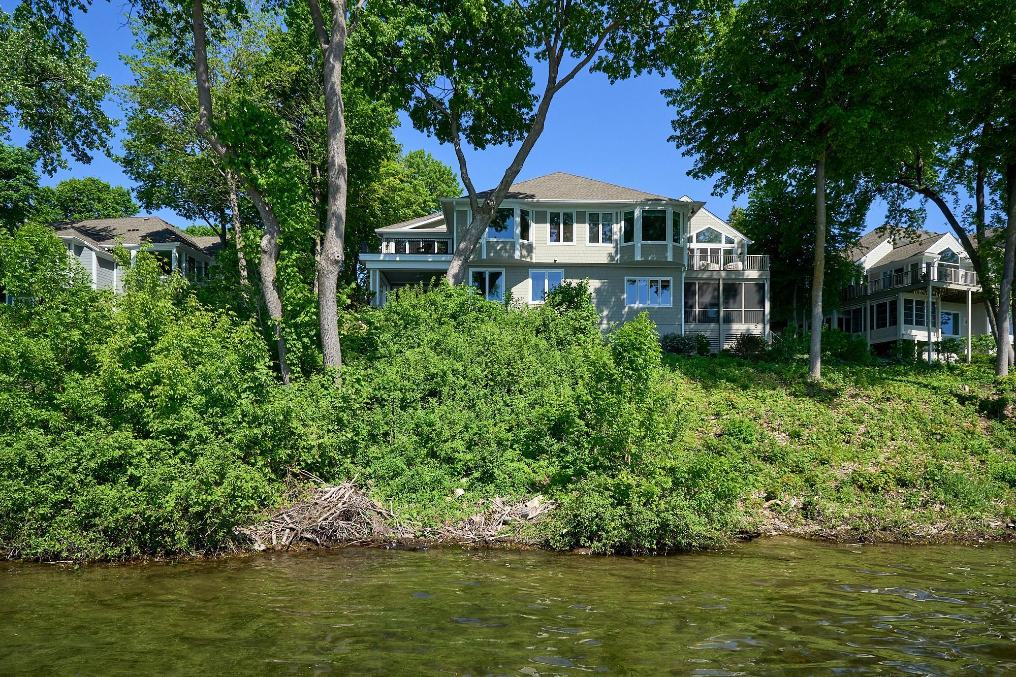 Just enough shrubbery to add privacy to the 3 decks that overlook the lake