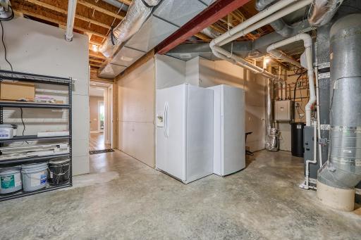 Utility room has space for storage. The Entire HVAC system was replaced: New furnace, air conditioning system, air exchange system, humidification system, Dual-zone climate control, and Digital thermostats for each zone.