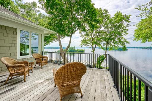 Enjoy sunsets from the upper deck. Premium IPE (ironwood) decking and non-rusting aluminum railings allow you to enjoy the benefits of maintenance-free decking without the scorching heat of composite deck boards
