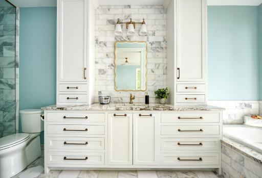 Custom-designed master highlights this lake view with its stunning tile shower and deep soaking tub with a stunning Lake Minnetonka's Spring Park Bay for total place for enjoyment and relaxation.