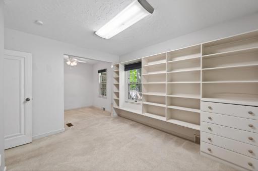 Main Floor Third Bedroom Bookcases and more