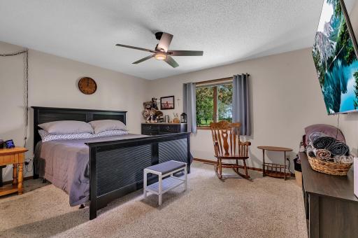 Primary bedroom with views of the golf course.