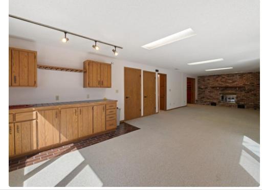 Family Room with beautiful built-in bar cabinets