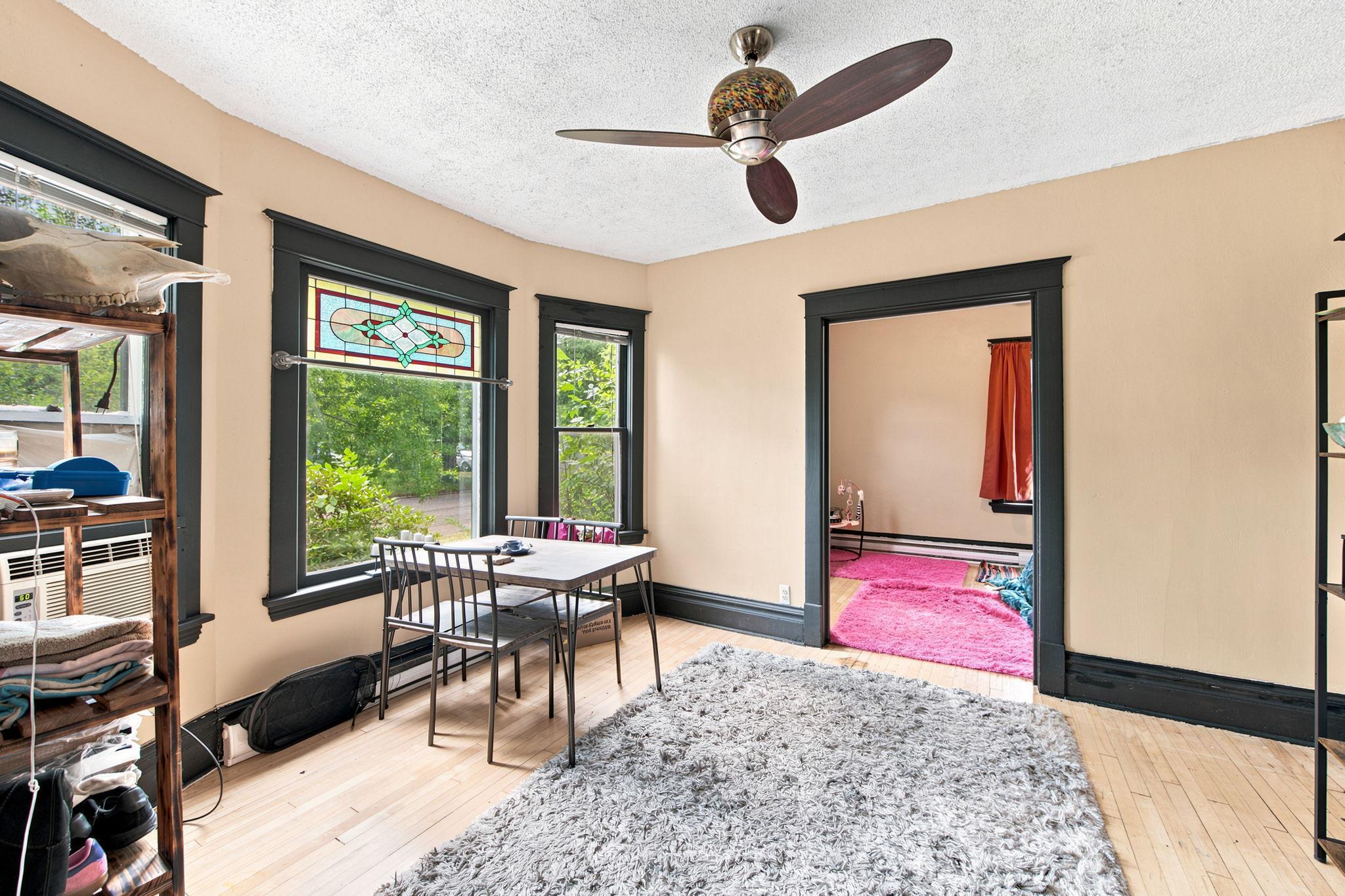 Bright Dining Area with stained glass window