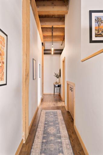 Down the hall you'll find both bedrooms and a full bath, along with a large storage space under the loft.