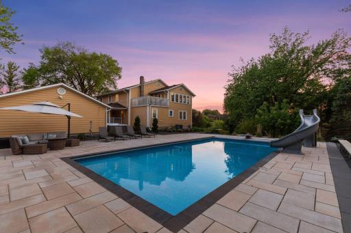 The ultimate private retreat, this 40x20 pool has a techno-bloc pool surround. Nestled between the house and the garage is a hot tub which the sellers are including in the sale.
