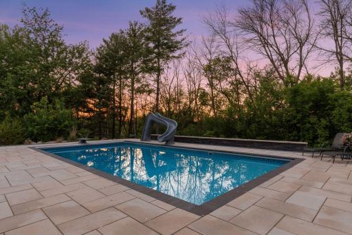 The pool features an 8-foot-deep end and an 8-foot-wide sun shelf with 1-foot-deep water.