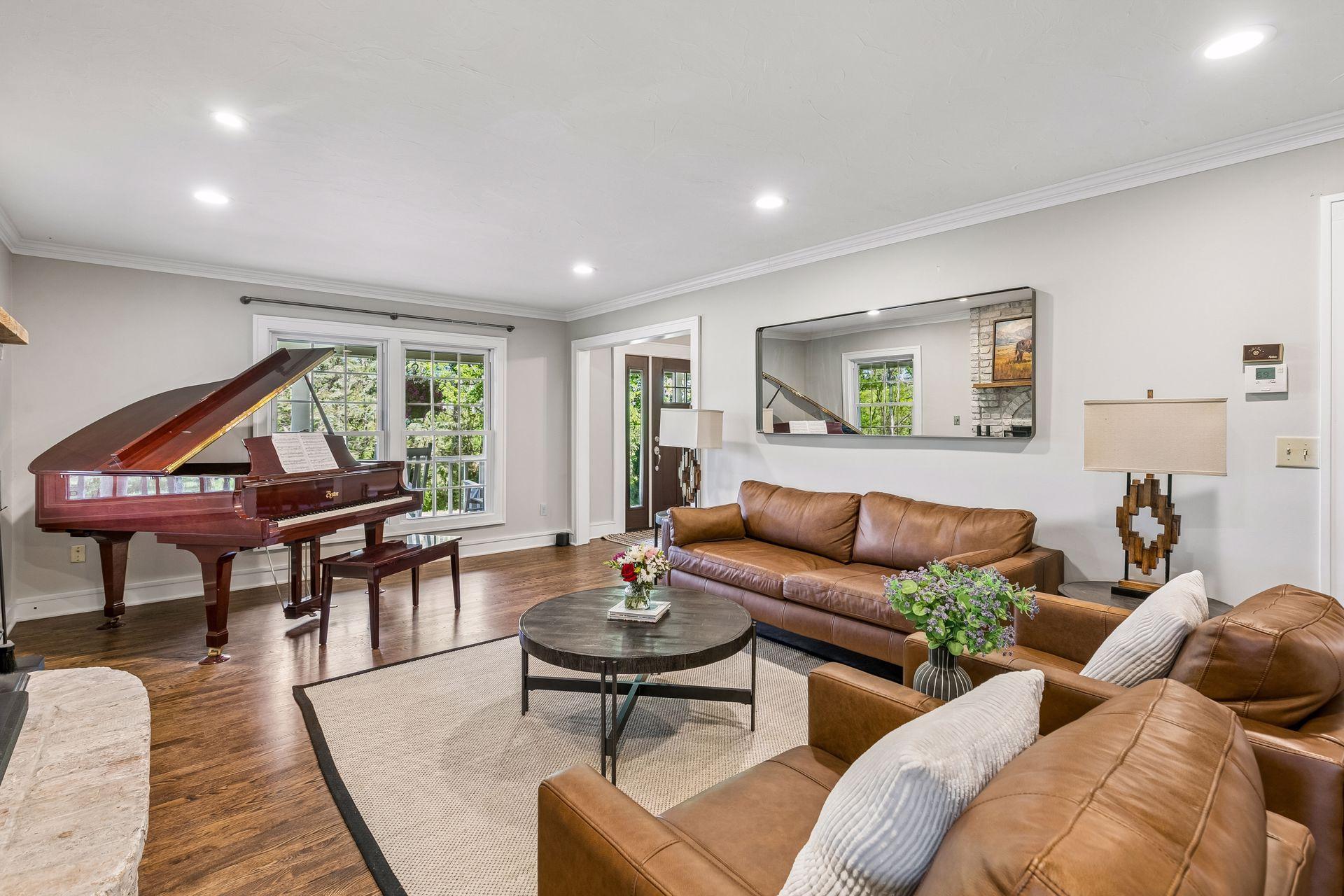 Crown molding adds architectural interest to the room and is highlighted by perimeter recessed lighting.