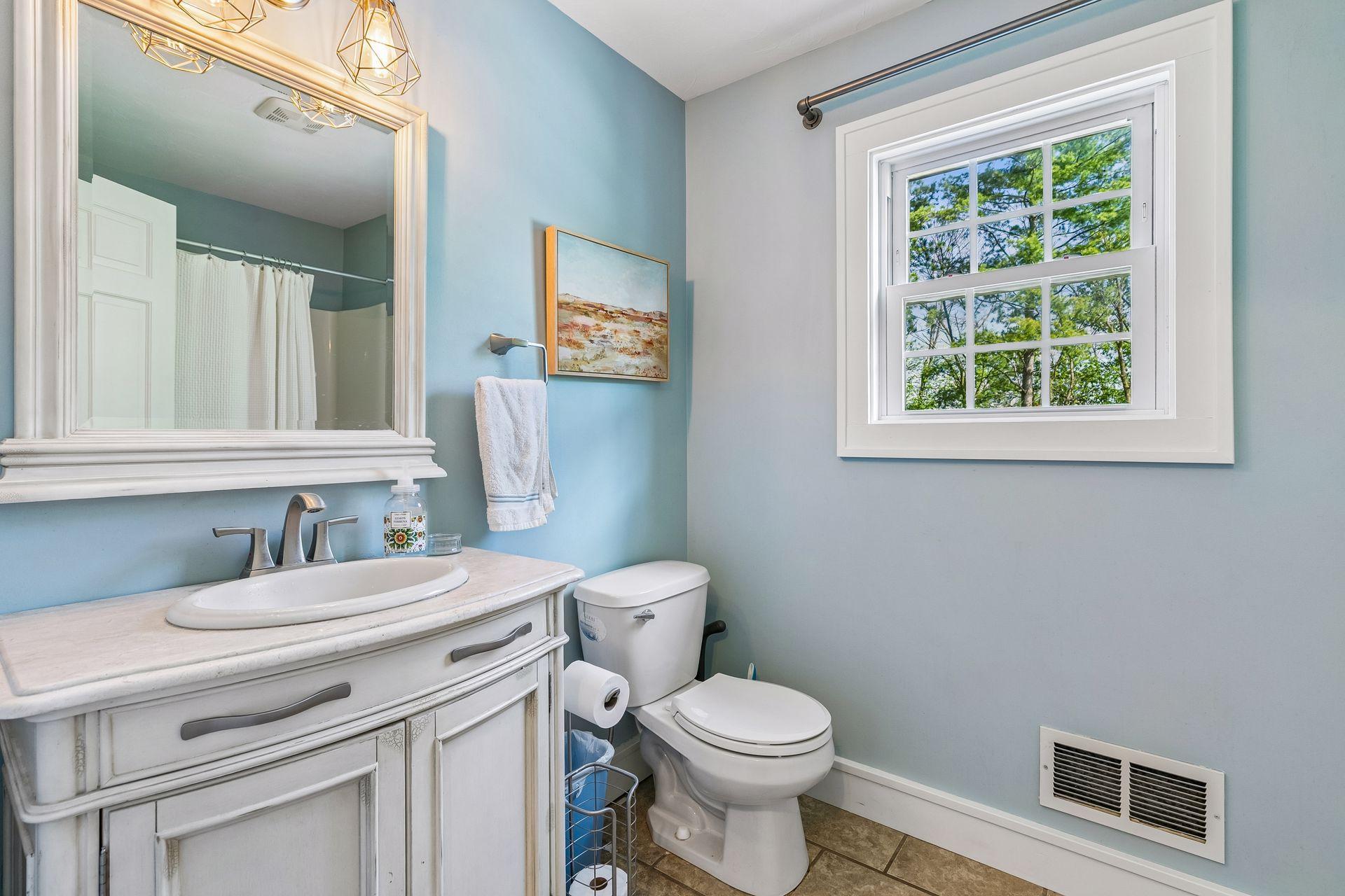 It is located near the main floor bathroom which is a full bath with a tub/shower combination.