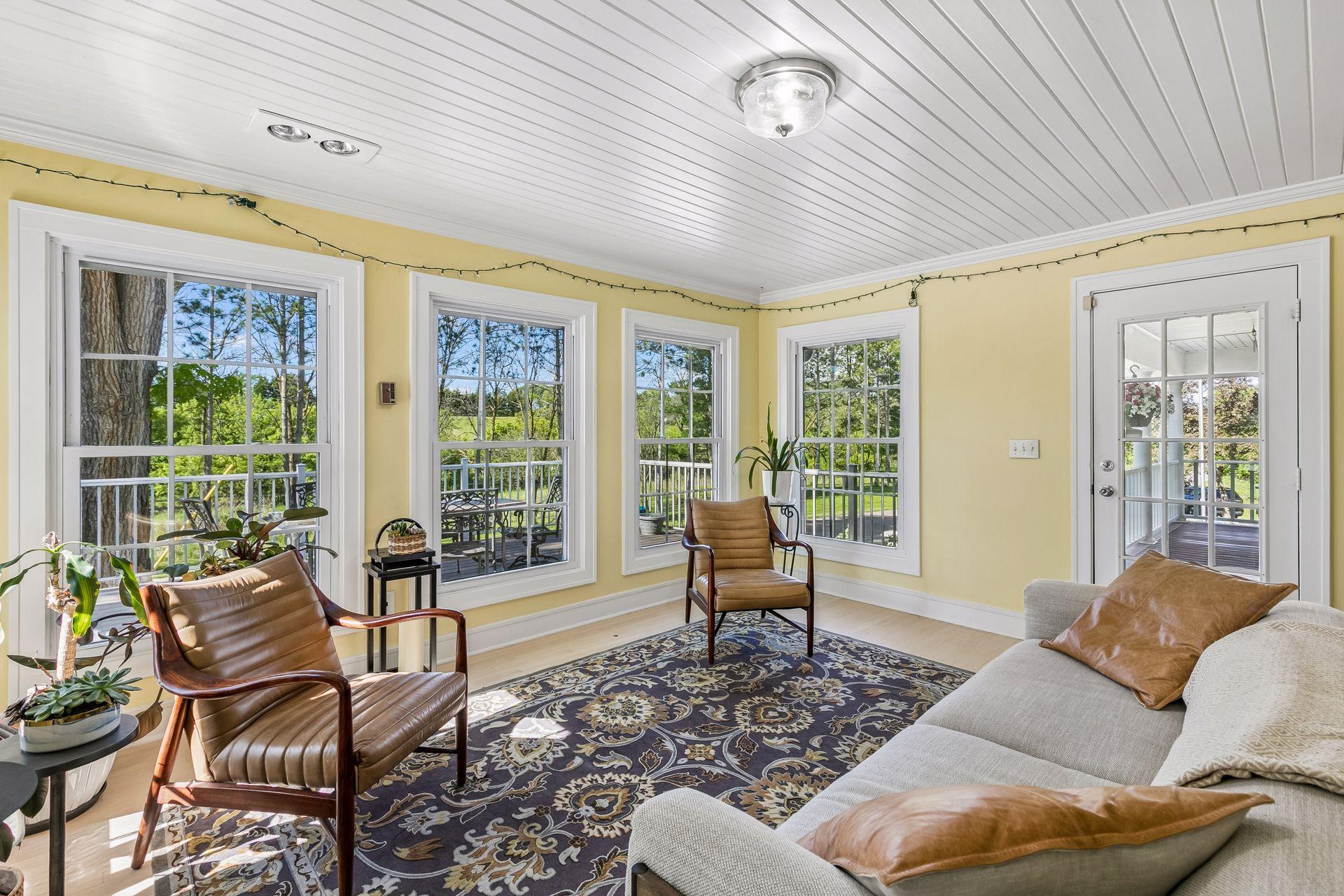 It is a wonderful place to enjoy the winter sun and is surrounded by a wraparound deck that receives filtered shade in the summer.