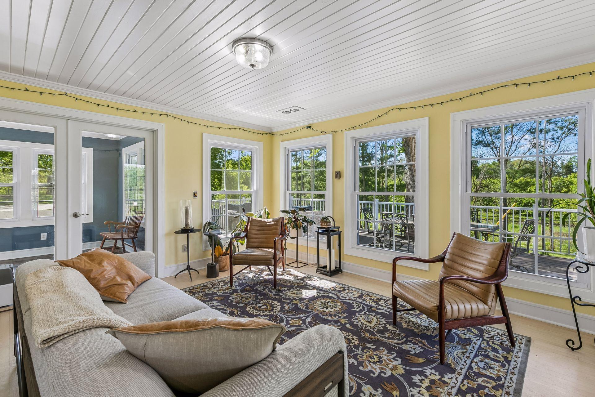This south facing sunroom is accessed from the living room, study and three-season porch.