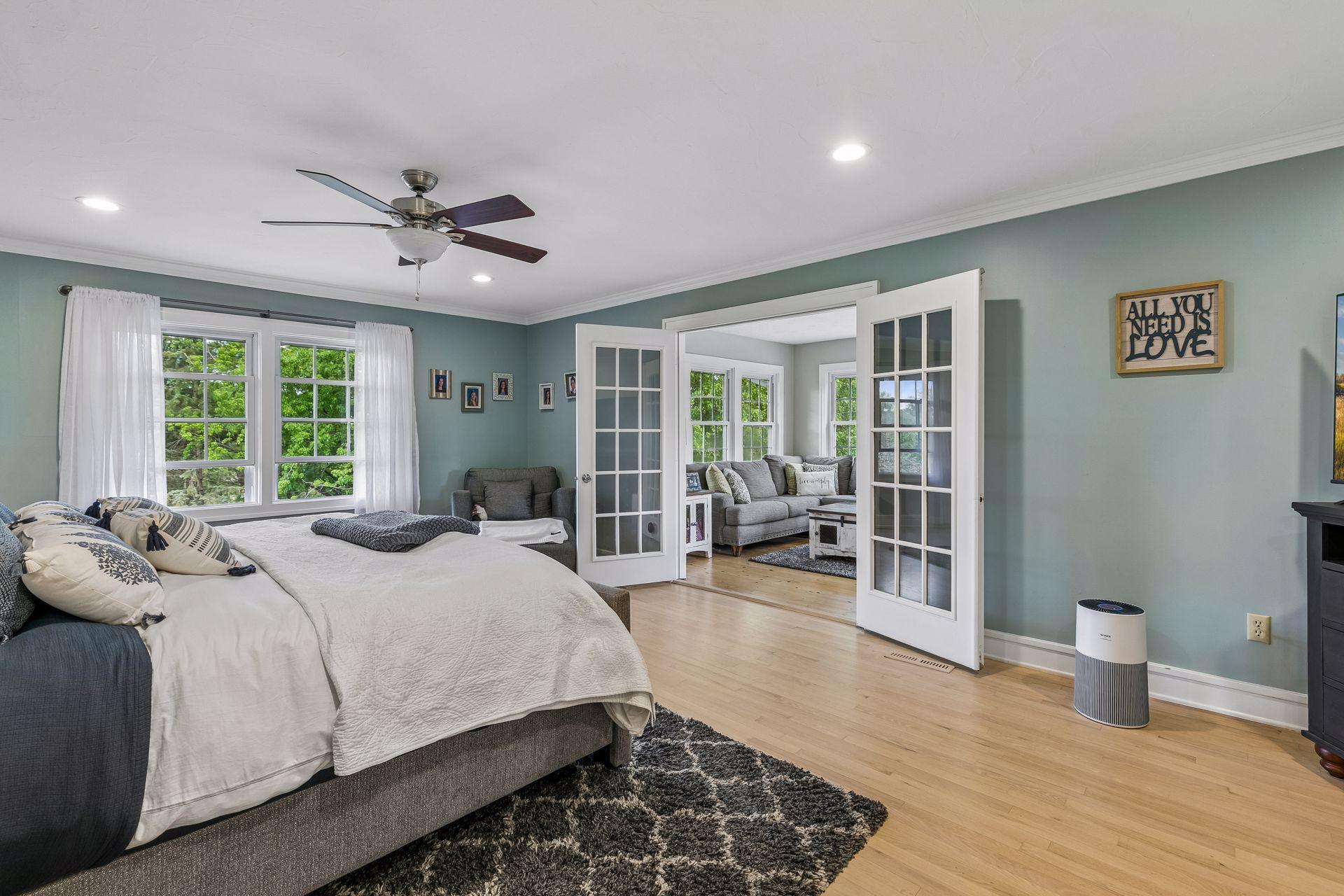 The massive primary suite has its own sitting room and private deck.