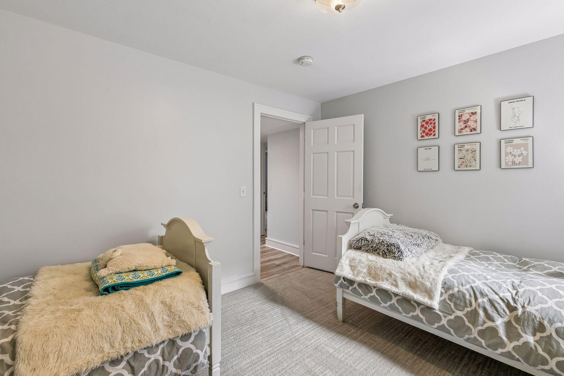 The rooms on this level have nice carpet with practical LVP flooring in the hallways.