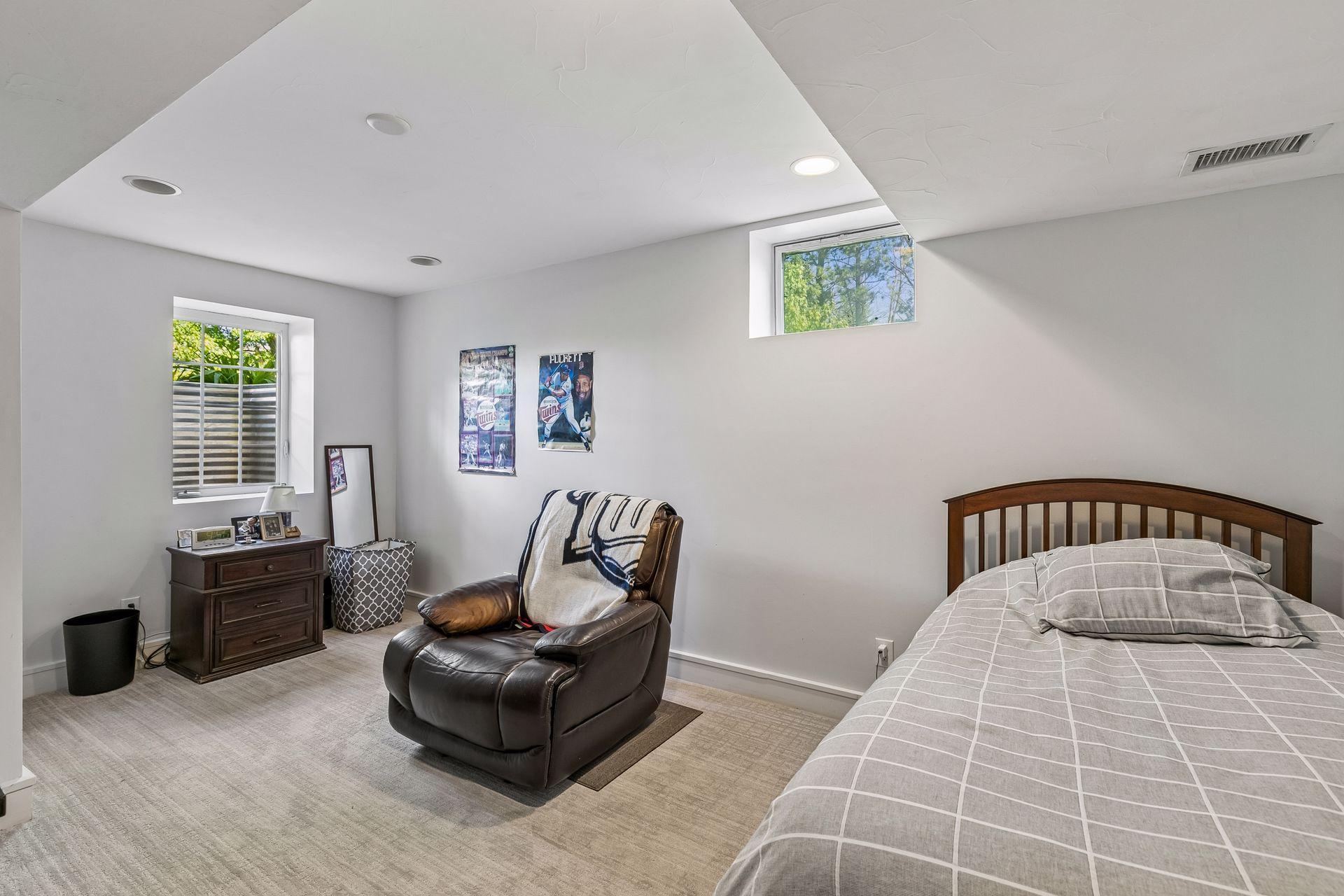 The fifth bedroom is in the lower level.