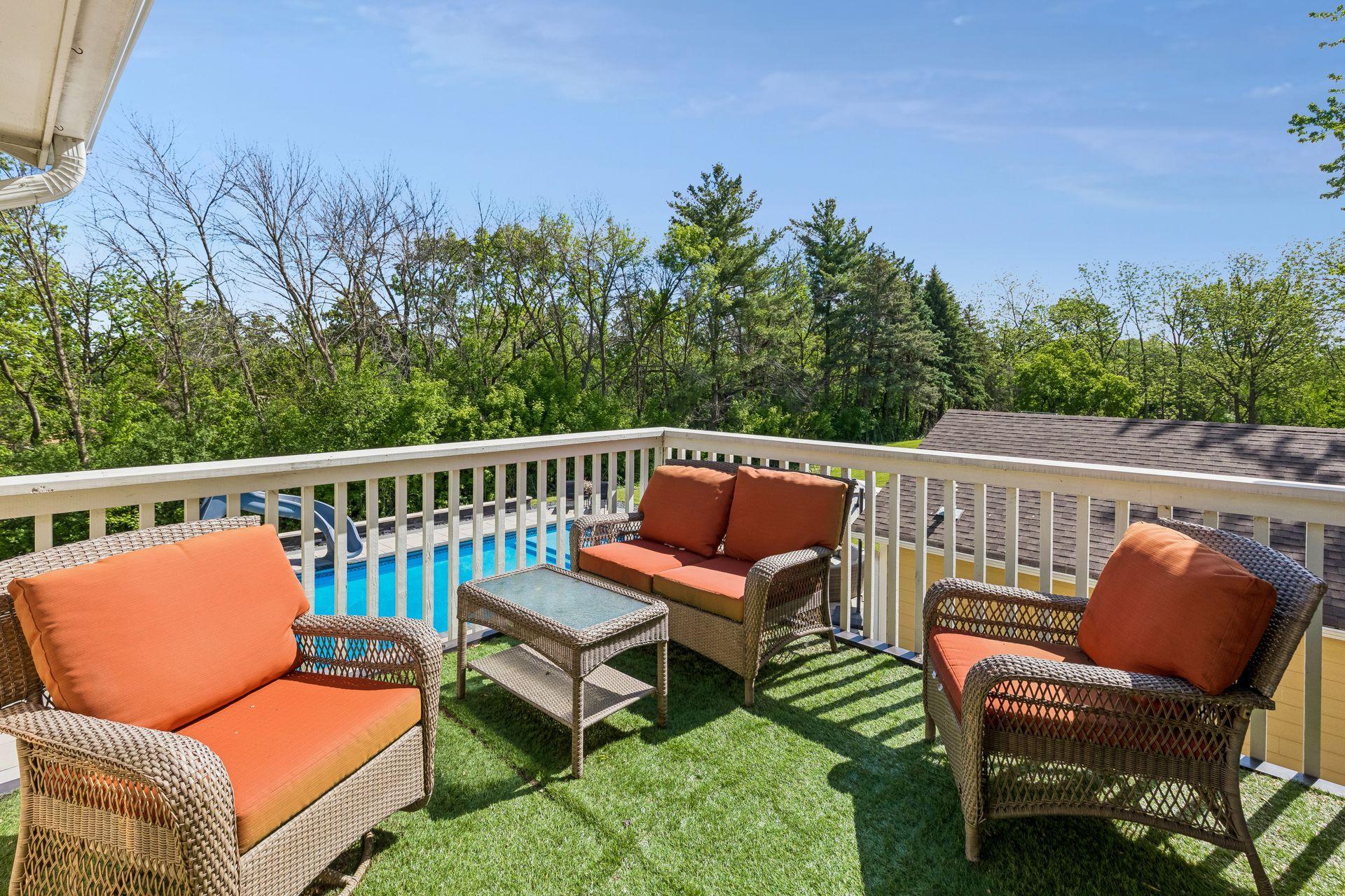 The private primary suite deck overlooks pool area.