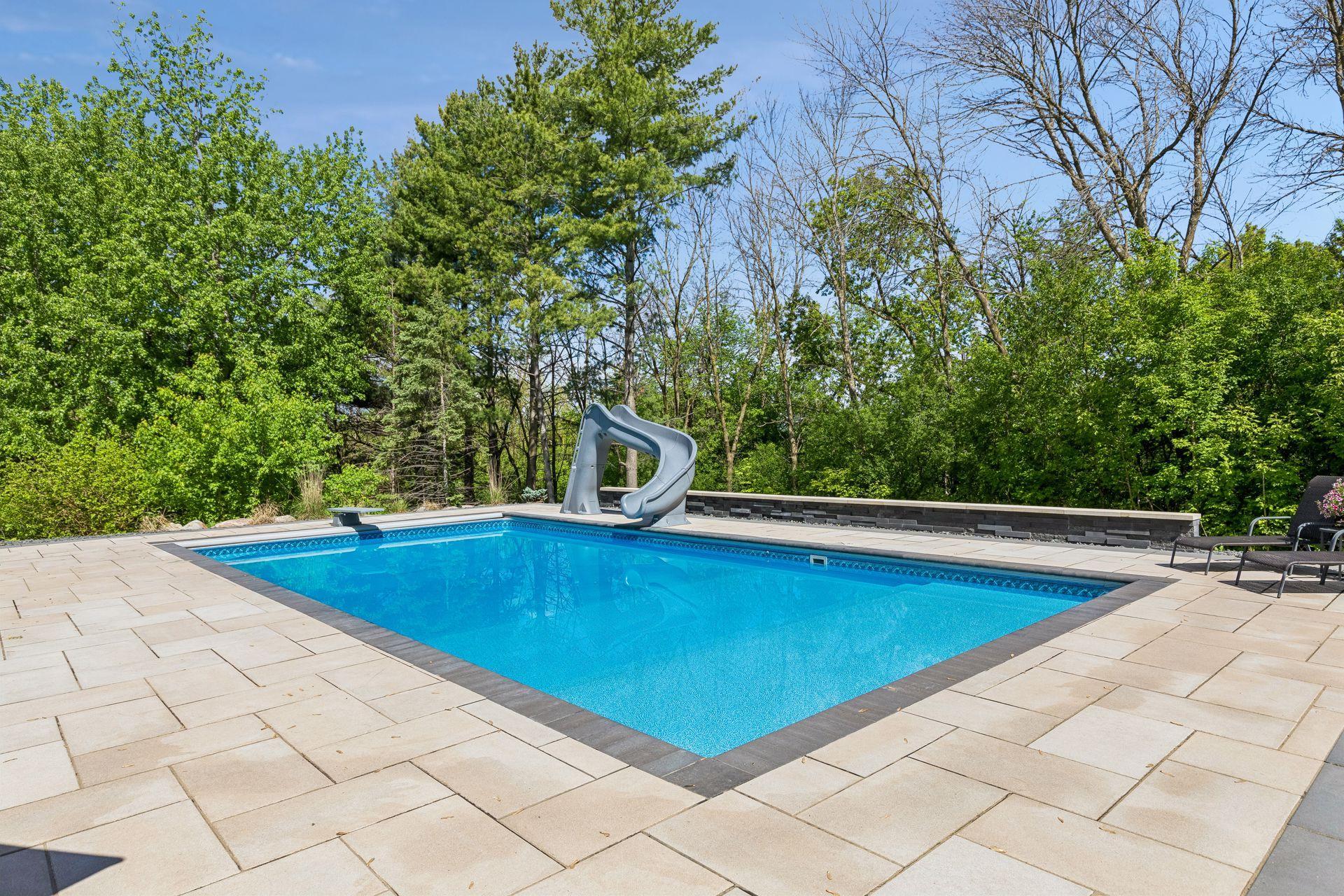 There is a slide and diving board.