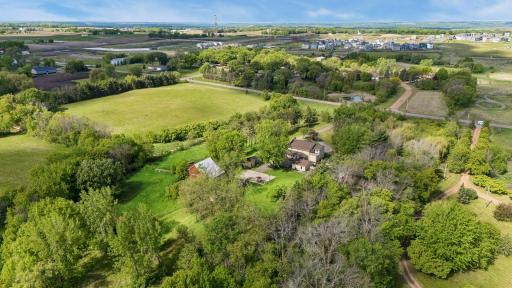 This unique, secluded acreage property offers exceptional indoor and outdoor living spaces.