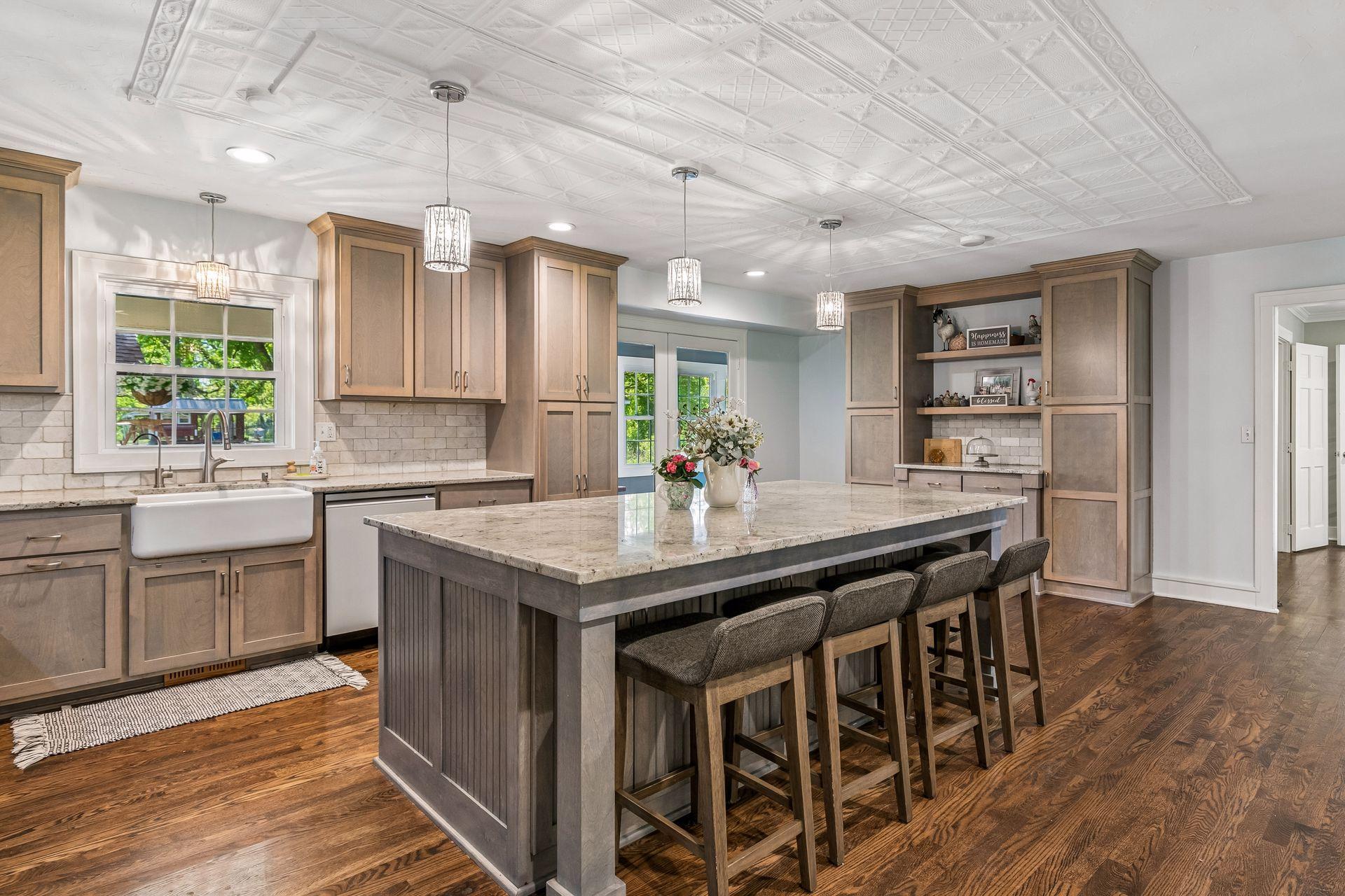 There is a large amount of cabinetry for storage and a small serving buffet for entertaining or display.