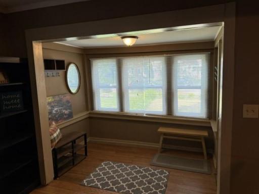 Nice front foyer and sitting area overlooking the front yard.
