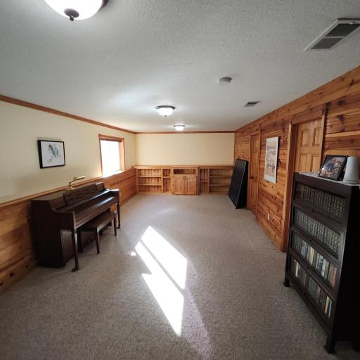 Lower level family room with lookout windows