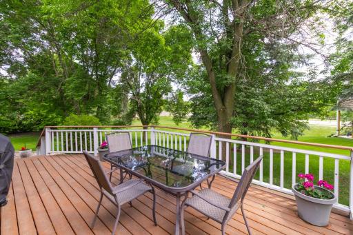 Large deck with view of half of backyard.