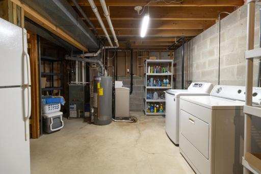 4th level unfinished basement with washer and dryer.