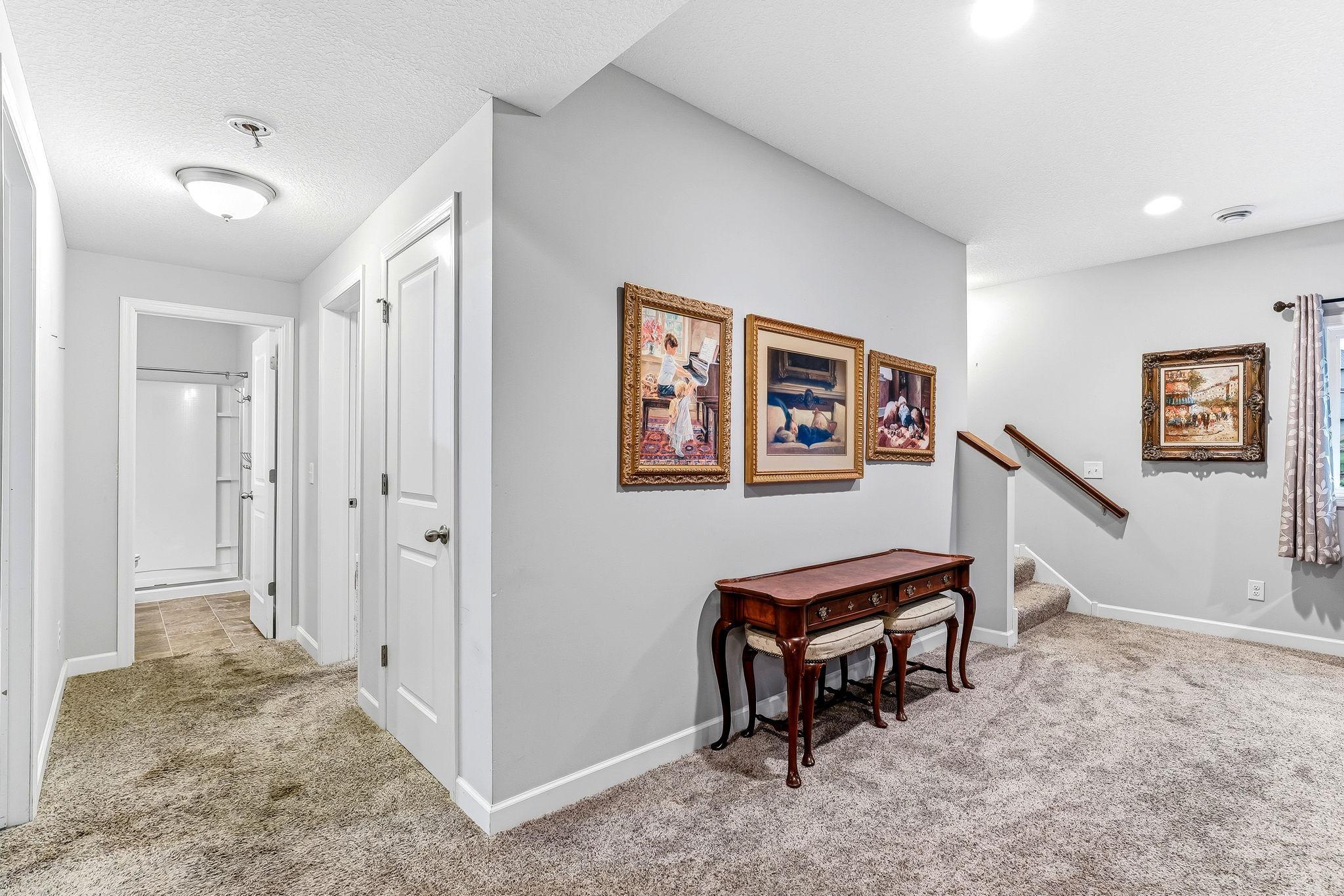 A spacious lower level designed for comfort and flexibility, featuring a bright family room perfect for gathering, a private fourth bedroom, and third bath.