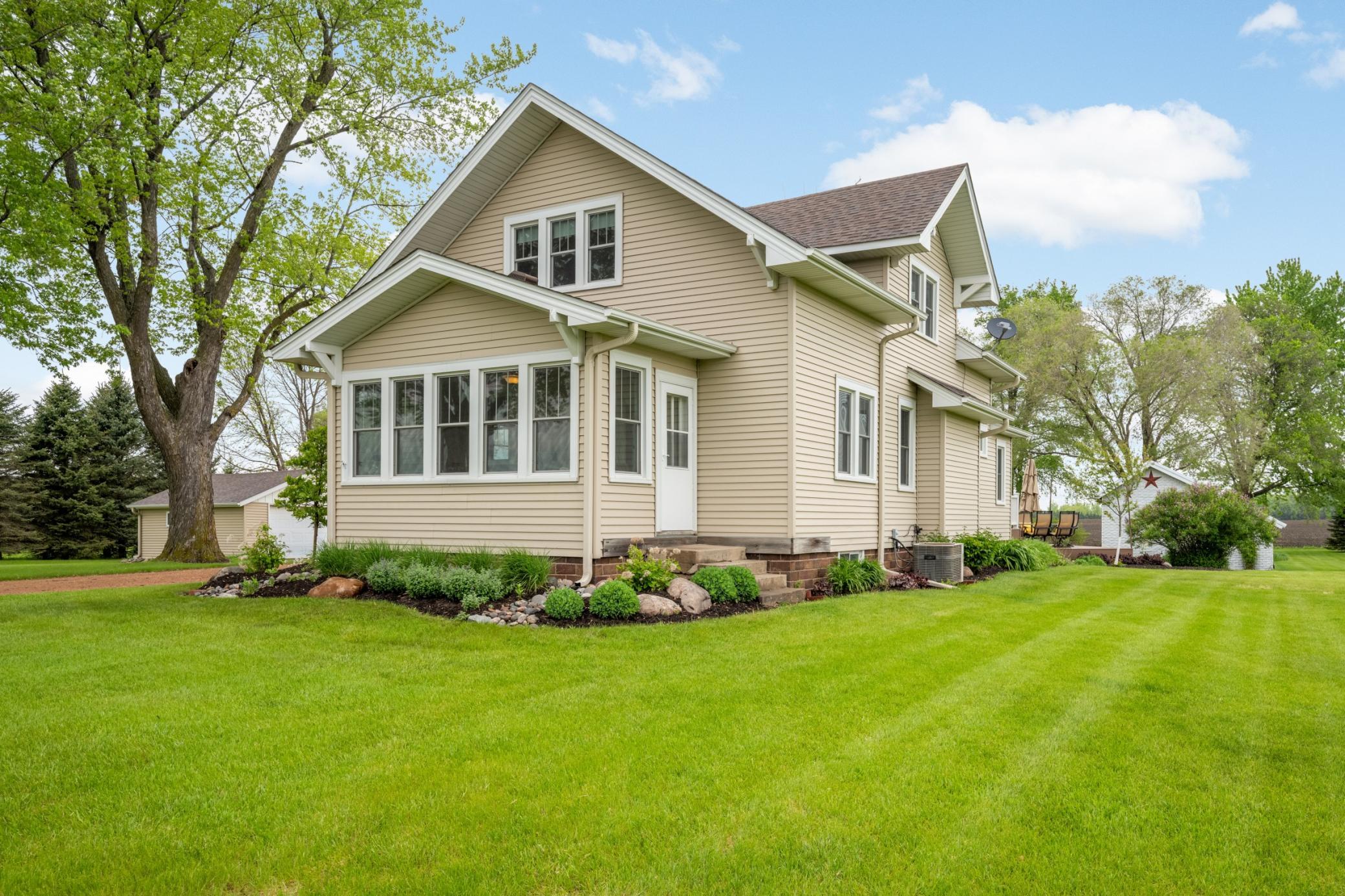 Charming front porch with door to the front yard.