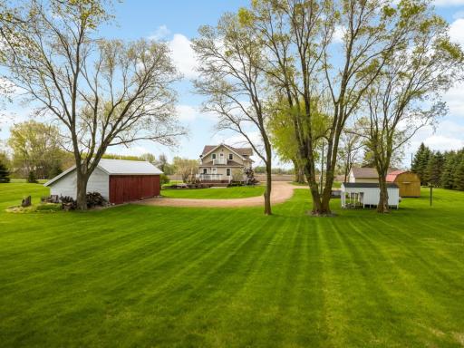 Meticulously landscaped & well cared for acreage