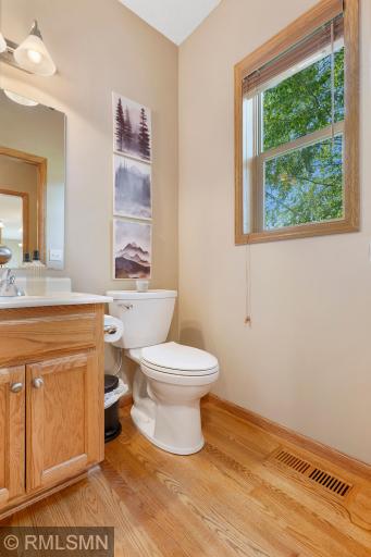 Main level bathroom next to kitchen